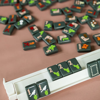 Olive Texas-themed Mahjong tiles featuring Western-inspired designs like cowboy boots, wildflowers, and BBQ motifs for playful and bold game night vibes