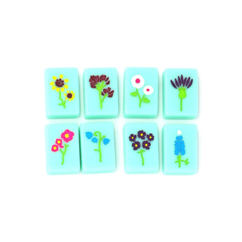 Turquoise Texas-themed Mahjong tiles featuring flowers
