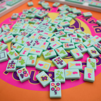 Turquoise Texas-themed Mahjong tiles featuring Western-inspired designs like cowboy boots, wildflowers, and BBQ motifs for playful and bold game night vibes