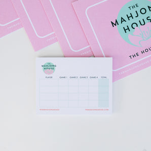 The Mahjong House branded pink card set with matching score pad for Mahjong players.