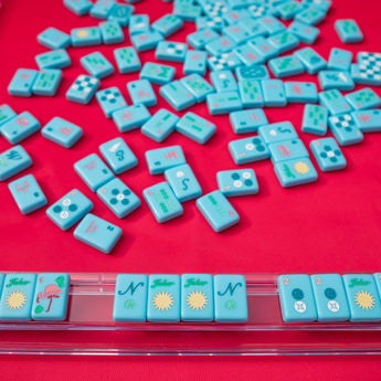 Bright blue Mahjong tiles from island collection. Tile size: 1" x 1 7/16" x 7/16". 