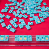 Bright blue Mahjong tiles from island collection. Tile size: 1" x 1 7/16" x 7/16". 