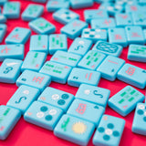 Bright blue Mahjong tiles from island collection. Tile size: 1" x 1 7/16" x 7/16". 