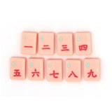 Pink Craks Mahjong tiles from island collection. Tile size: 1" x 1 7/16" x 7/16". 