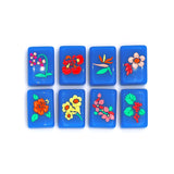 Royal blue Mahjong tiles from island collection featuring flowers
