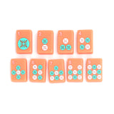 Salmon Mahjong tiles from island collection featuring dots