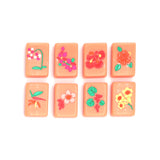 Salmon Mahjong tiles from island collection featuring flowers