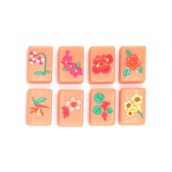 Salmon Mahjong tiles from island collection featuring flowers