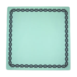 Green Mahjong mat with a floral border design
