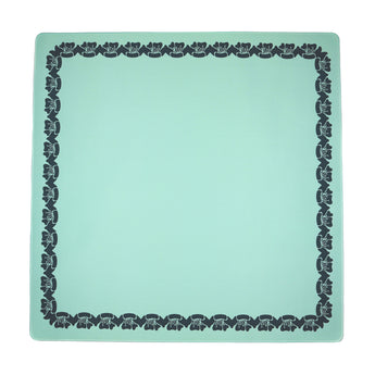 Green Mahjong mat with a floral border design
