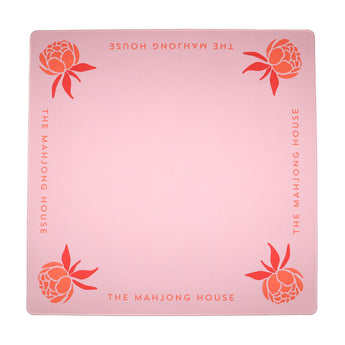 Coral Mahjong mat with blue peony corner details and “The Mahjong House” logo