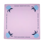 Lavender Mahjong mat with blue peony corner details and “The Mahjong House” logo