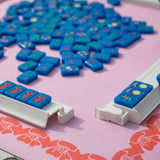 Pink and coral Mahjong mat with a floral border design