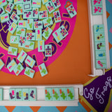 Colorful TCU Mahjong mat with cowboy boots, gators, and “Go Frogs” pennants in bold purple, pink, orange, and blue