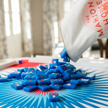 Mahjong mat with bold red, white, and blue starburst design
