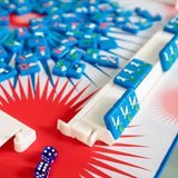 Mahjong mat with bold red, white, and blue starburst design