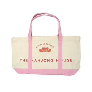 Pink canvas Mahjong carry-all tote bag with logo, perfect for storing tiles, racks, mats, and game accessories