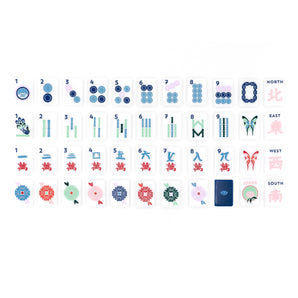 Navy Mahjong tile set from the House Collection, featuring intricately designed tiles with floral motifs, butterflies, and peacocks. Tile size: 1" x 1 7/16" x 7/16". 