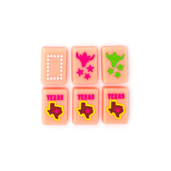 Pink Texas-themed Mahjong tiles featuring custom dragons and jokers