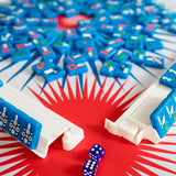 Blue Texas-themed Mahjong tiles featuring Western-inspired designs like cowboy boots, wildflowers, and BBQ motifs for playful and bold game night vibes